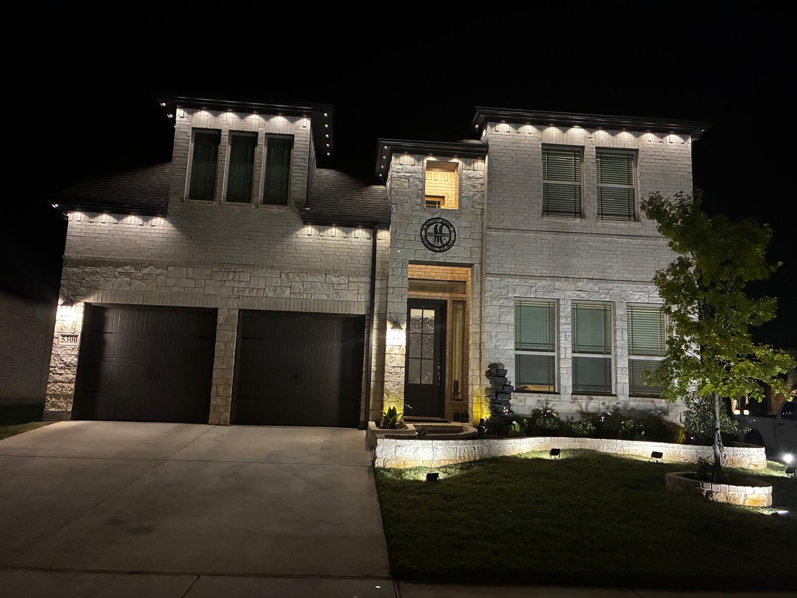 Home at night with Govee permanent lights on