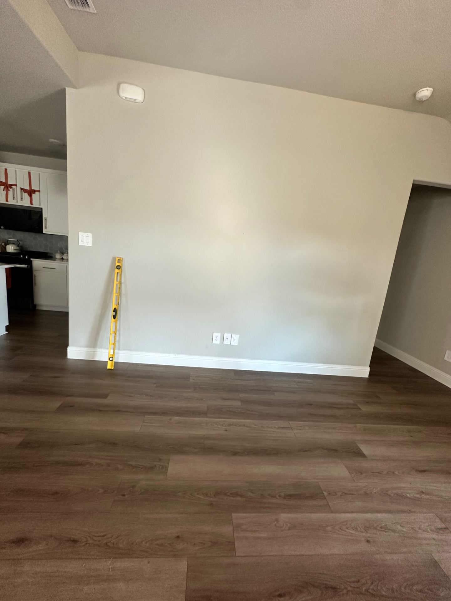 Living room wall before custom media wall installation