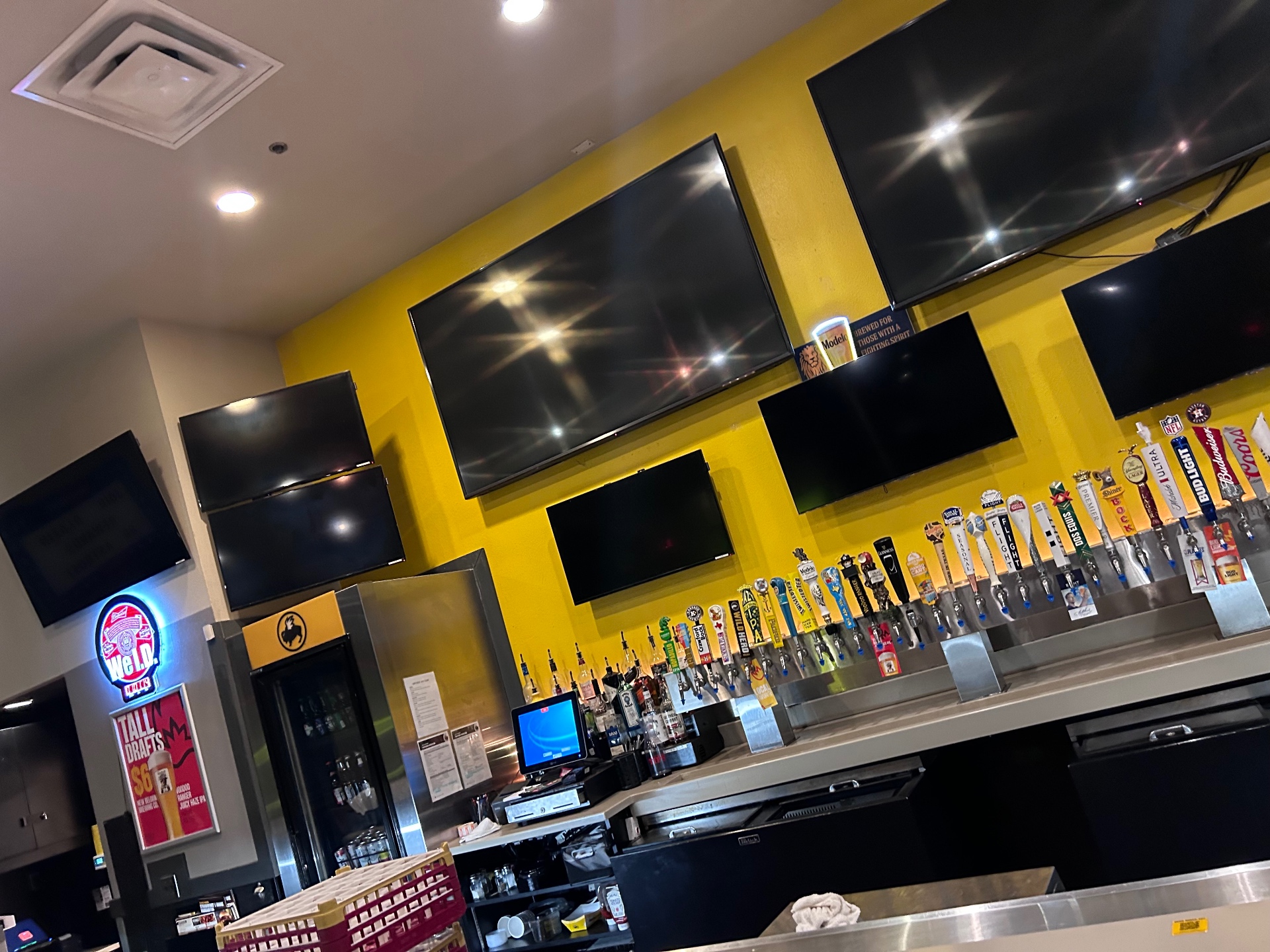 Sports bar before — yellow walls