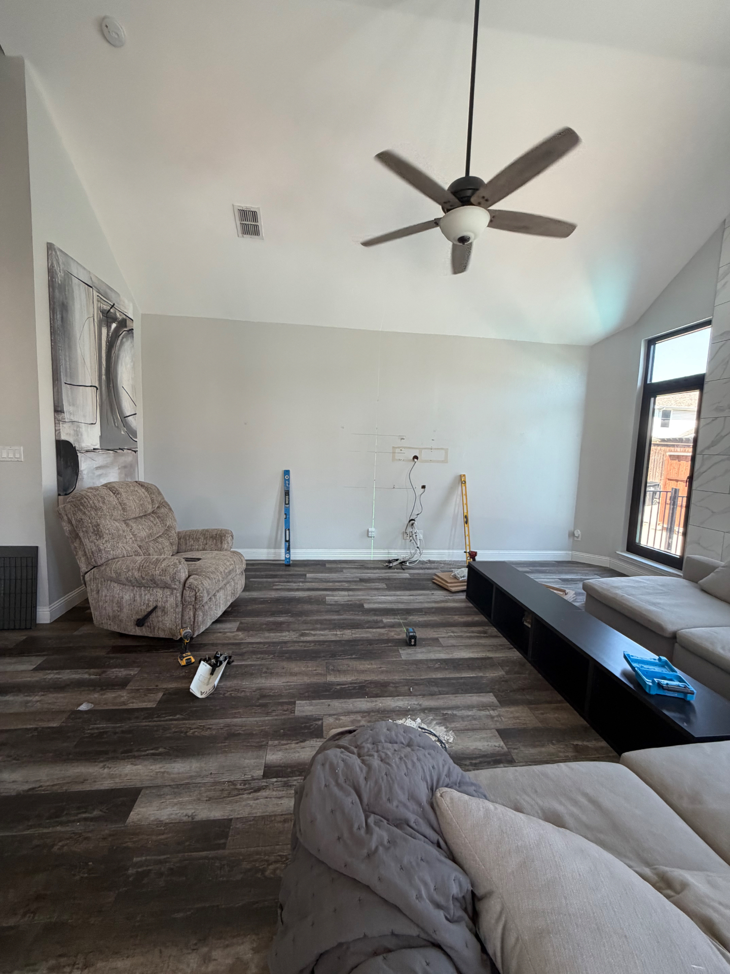 Empty living room wall before acoustic paneling