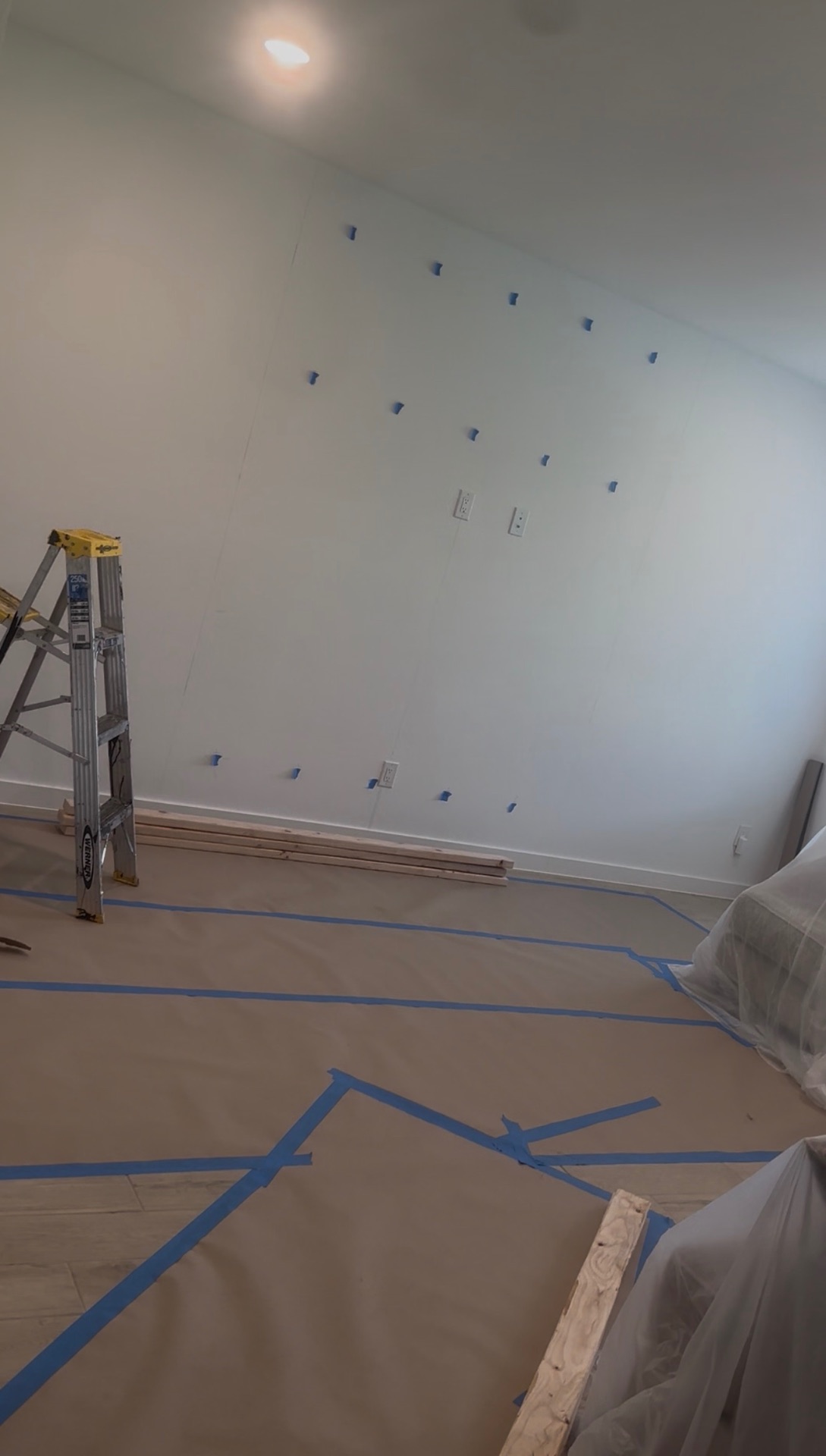 Wall prepared before custom media wall installation
